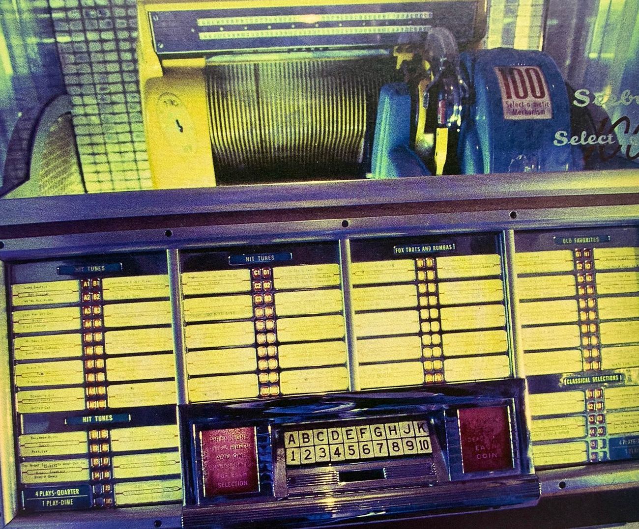 The record mechanism and song-selection panel of a 1952 Seeburg M100C jukebox.